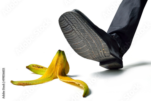 man about to step on banana peel