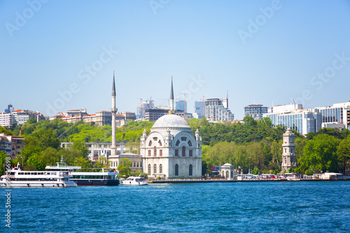 Beautiful small mosque stands on the banks of the Bosphorus, Istanbul