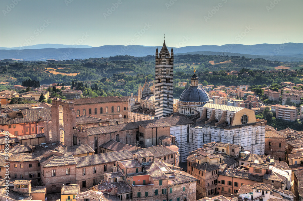View over Siena from the Torre del Mangia on Piazza del Campo looking at the Siena Cathedral  HDR