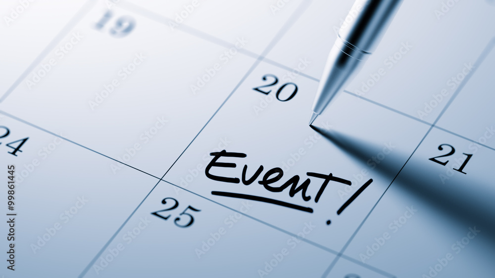 Closeup of a personal agenda setting an important date written w Closeup of a personal agenda setting an important date written w