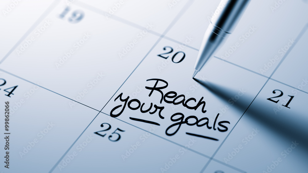 Closeup of a personal agenda setting an important date written w Closeup of a personal agenda setting an important date written w