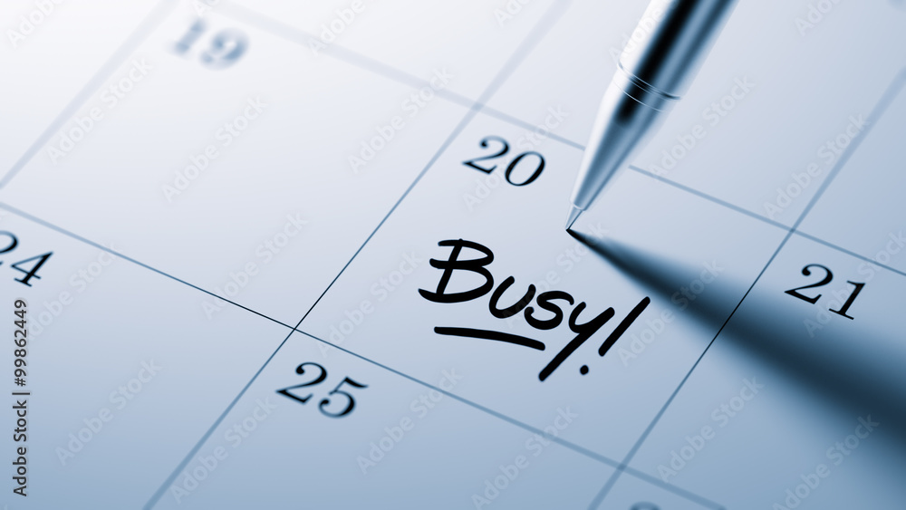 Closeup of a personal agenda setting an important date written w Closeup of a personal agenda setting an important date written w