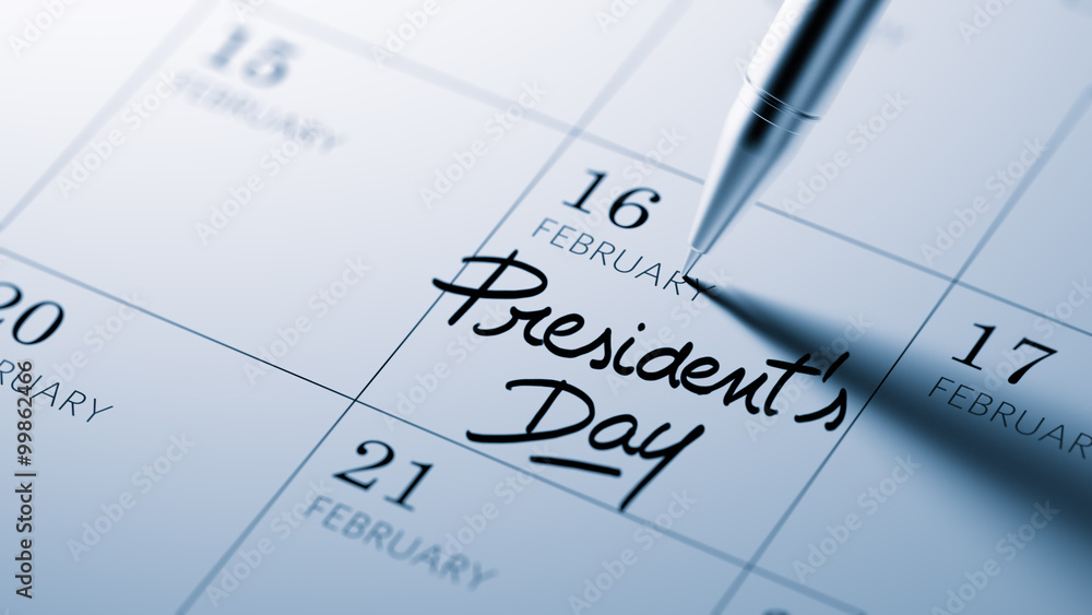 Closeup of a personal agenda setting an important date written w Closeup of a personal agenda setting an important date written w