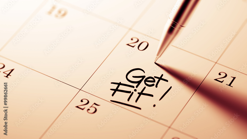 Closeup of a personal agenda setting an important date written w Closeup of a personal agenda setting an important date written w