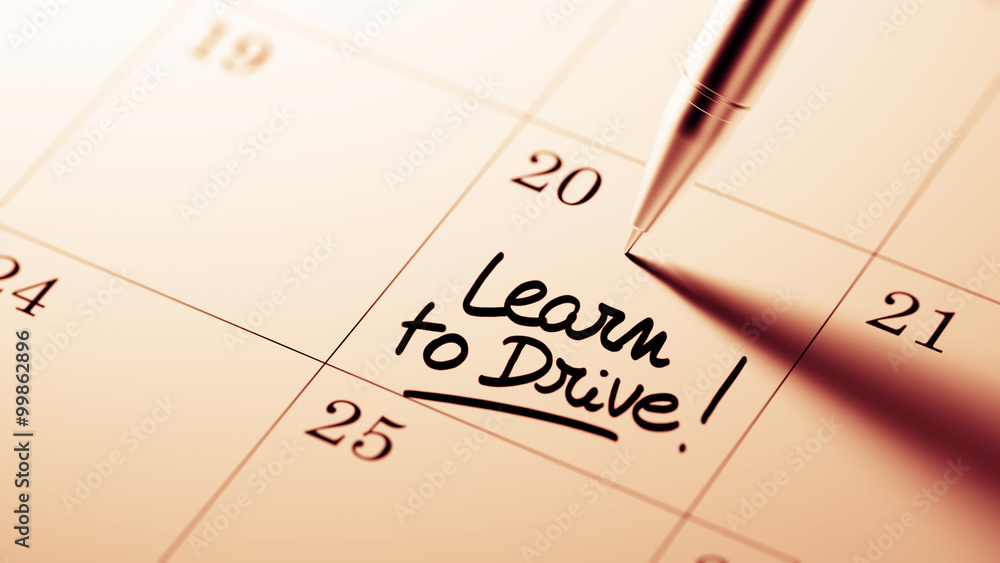 Closeup of a personal agenda setting an important date written w Closeup of a personal agenda setting an important date written w