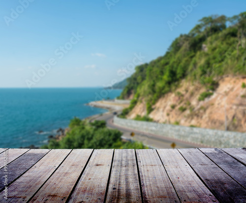 Blurred landscape with wood terrace 