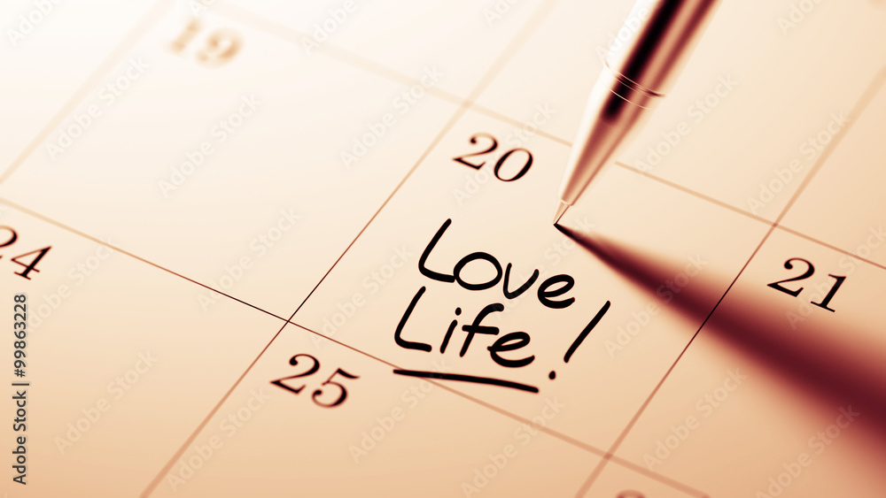 Closeup of a personal agenda setting an important date written w Closeup of a personal agenda setting an important date written w