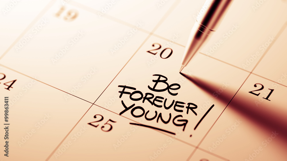 Closeup of a personal agenda setting an important date written w Closeup of a personal agenda setting an important date written w