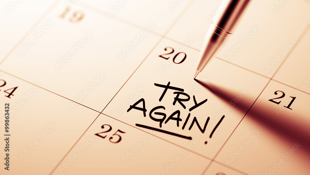 Closeup of a personal agenda setting an important date written w Closeup of a personal agenda setting an important date written w