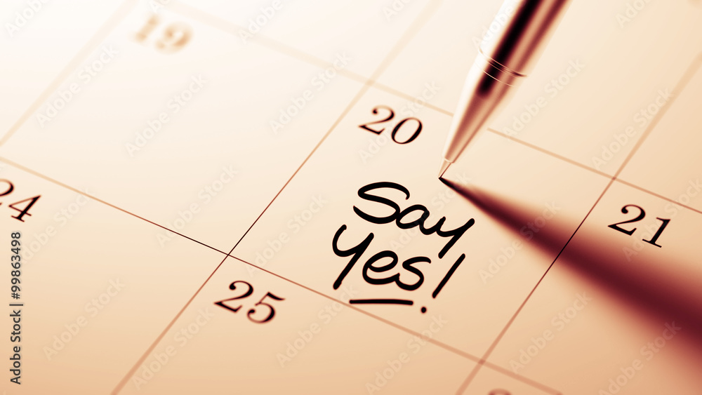 Closeup of a personal agenda setting an important date written w Closeup of a personal agenda setting an important date written w