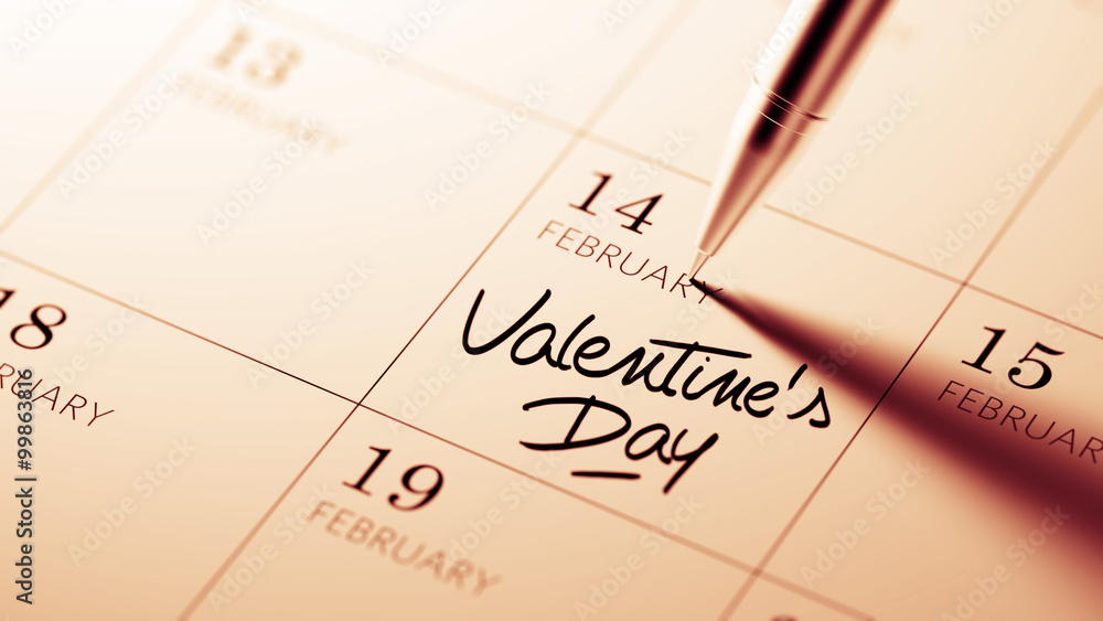 Closeup of a personal agenda setting an important date written w Closeup of a personal agenda setting an important date written w