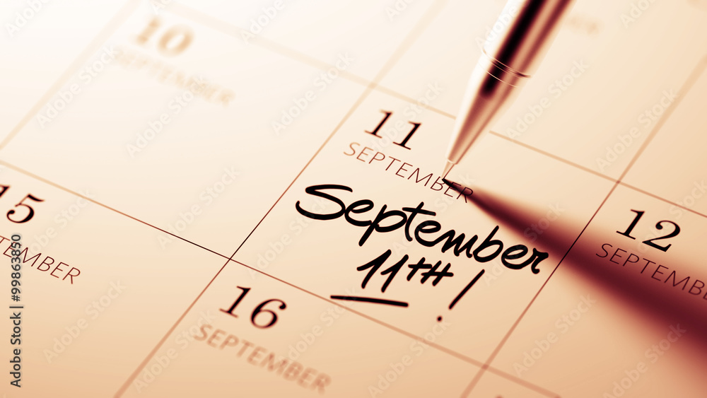 Closeup of a personal agenda setting an important date written w Closeup of a personal agenda setting an important date written w