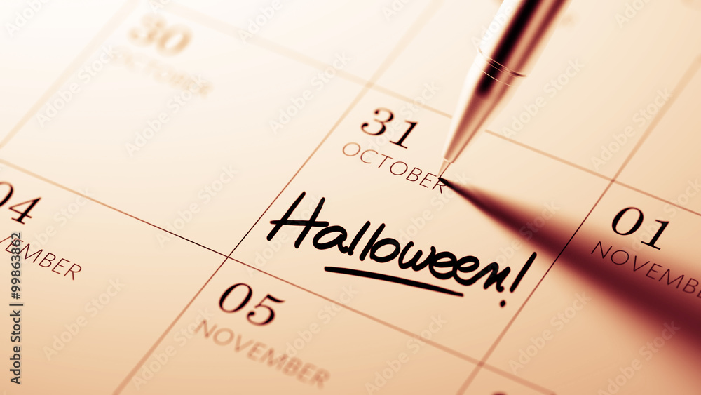 Closeup of a personal agenda setting an important date written w Closeup of a personal agenda setting an important date written w