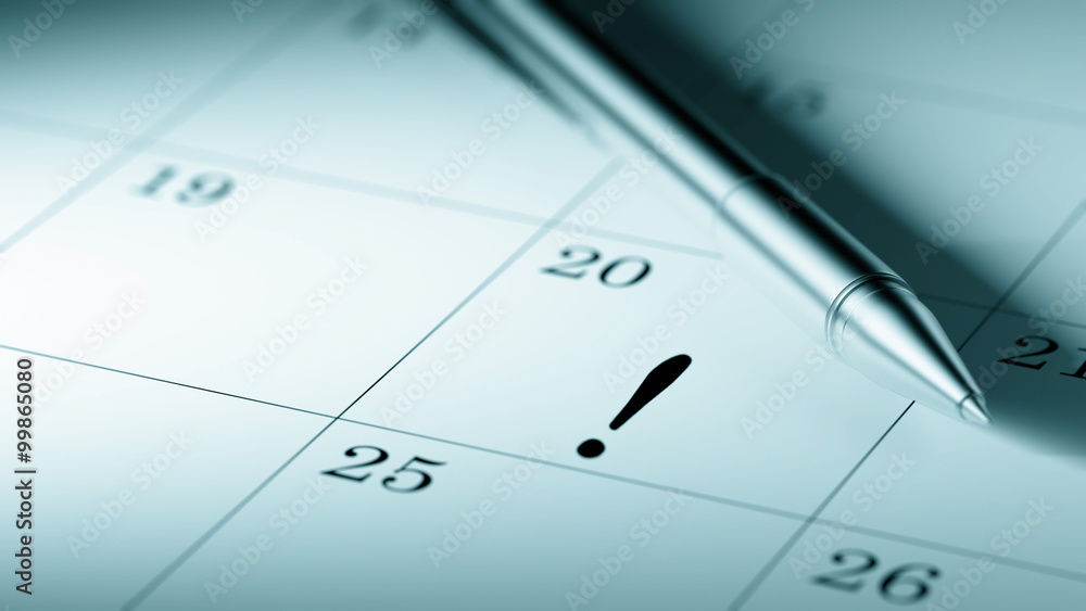 Closeup of a personal agenda setting an important date written w Closeup of a personal agenda setting an important date written w