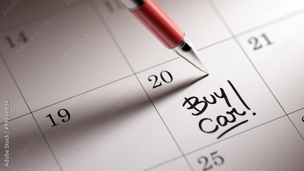 Closeup of a personal agenda setting an important date written w Closeup of a personal agenda setting an important date written w