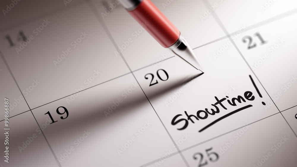 Closeup of a personal agenda setting an important date written w Closeup of a personal agenda setting an important date written w