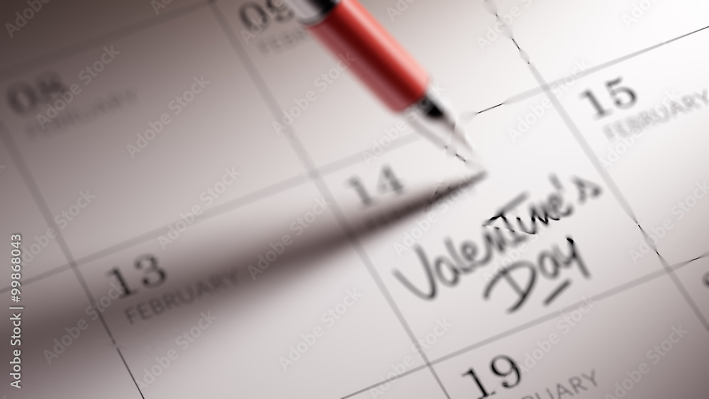 Closeup of a personal agenda setting an important date written w Closeup of a personal agenda setting an important date written w