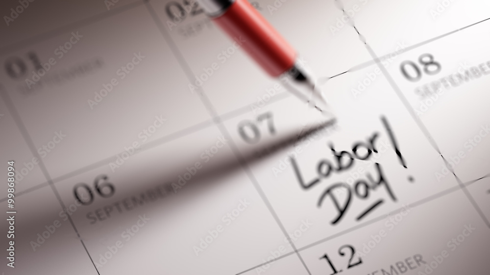 Closeup of a personal agenda setting an important date written w Closeup of a personal agenda setting an important date written w