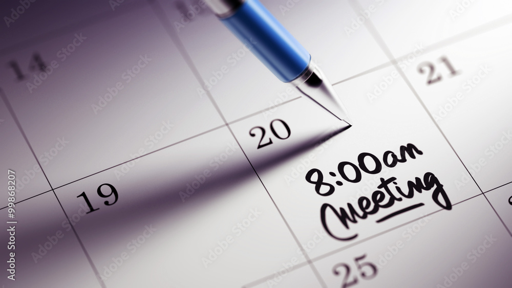 Closeup of a personal agenda setting an important date written w Closeup of a personal agenda setting an important date written w