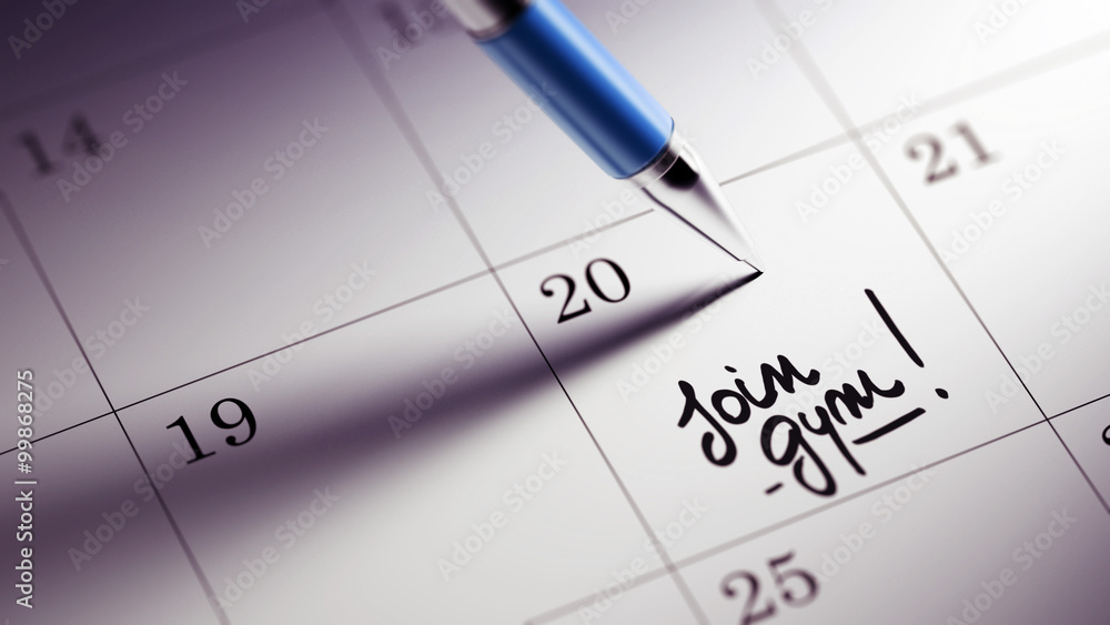 Closeup of a personal agenda setting an important date written w Closeup of a personal agenda setting an important date written w