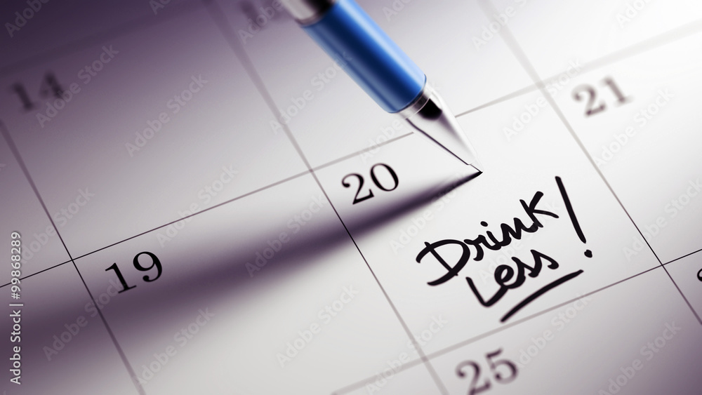 Closeup of a personal agenda setting an important date written w Closeup of a personal agenda setting an important date written w
