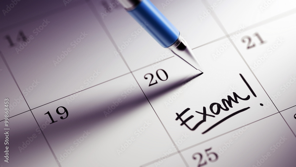Closeup of a personal agenda setting an important date written w Closeup of a personal agenda setting an important date written w