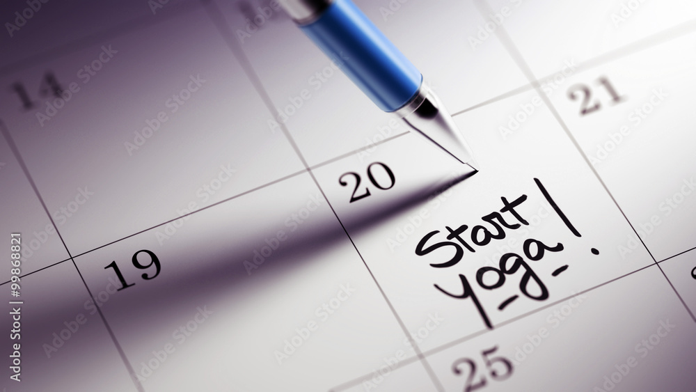 Closeup of a personal agenda setting an important date written w Closeup of a personal agenda setting an important date written w