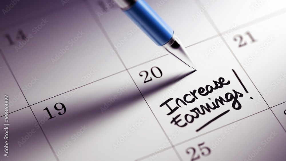 Closeup of a personal agenda setting an important date written w Closeup of a personal agenda setting an important date written w