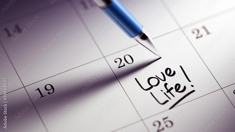 Closeup of a personal agenda setting an important date written w Closeup of a personal agenda setting an important date written w