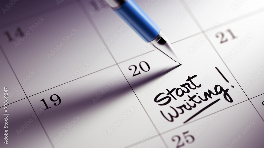 Closeup of a personal agenda setting an important date written w Closeup of a personal agenda setting an important date written w