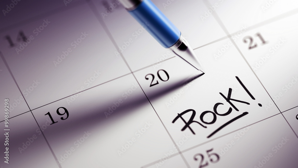 Closeup of a personal agenda setting an important date written w Closeup of a personal agenda setting an important date written w