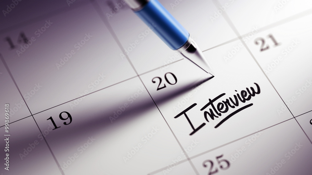 Closeup of a personal agenda setting an important date written w Closeup of a personal agenda setting an important date written w