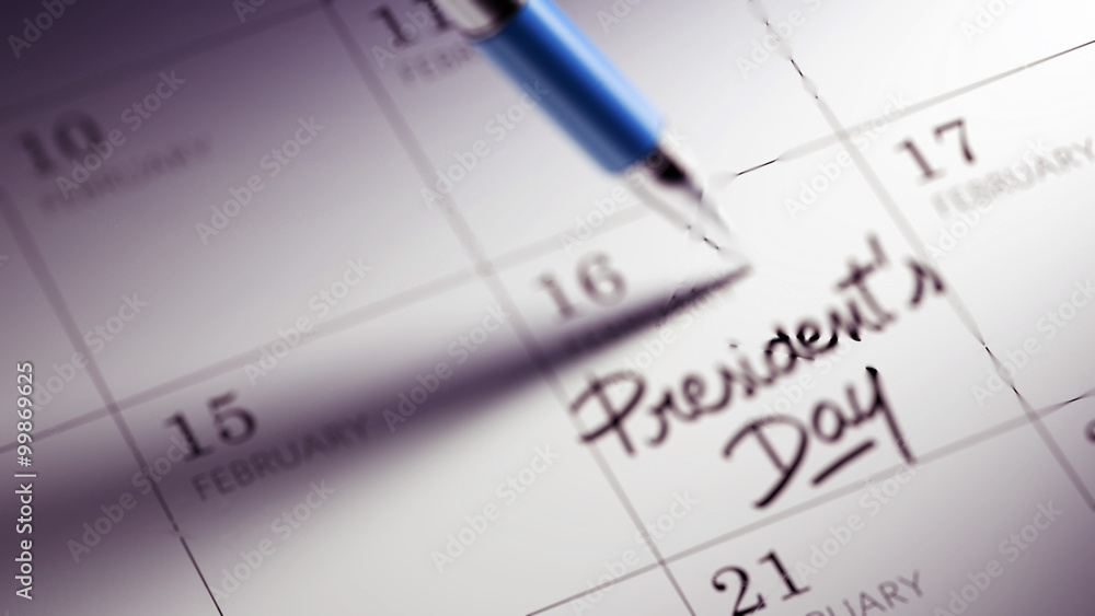 Closeup of a personal agenda setting an important date written w Closeup of a personal agenda setting an important date written w