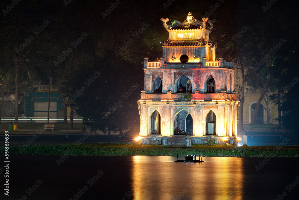 Turtle tower or Tortoise tower in Hoan Kiem lake in Hanoi illuminated at night