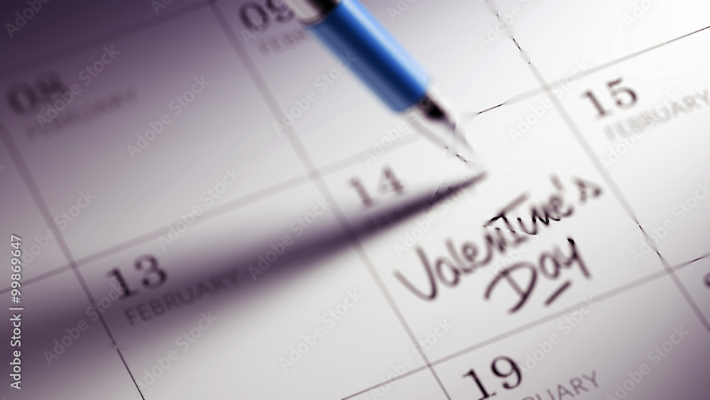 Closeup of a personal agenda setting an important date written w Closeup of a personal agenda setting an important date written w