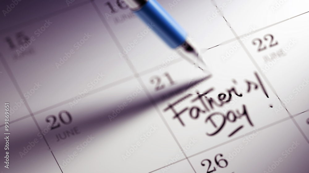 Closeup of a personal agenda setting an important date written w Closeup of a personal agenda setting an important date written w