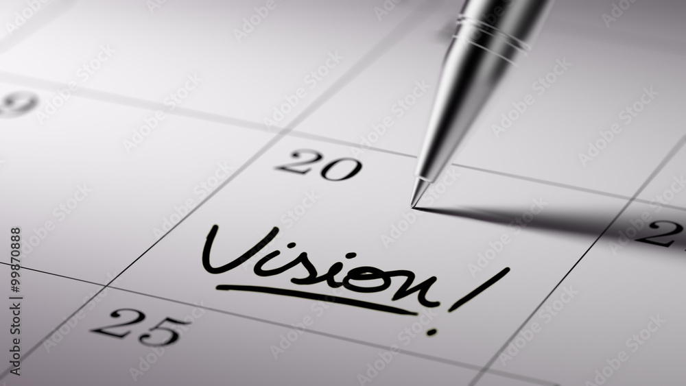 Closeup of a personal agenda setting an important date written w Closeup of a personal agenda setting an important date written w