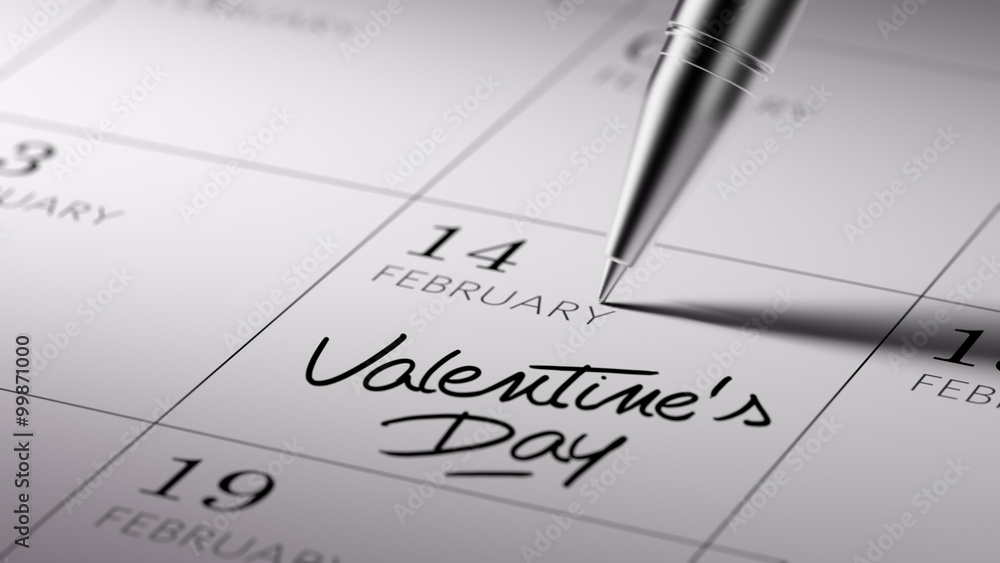 Closeup of a personal agenda setting an important date written w Closeup of a personal agenda setting an important date written w