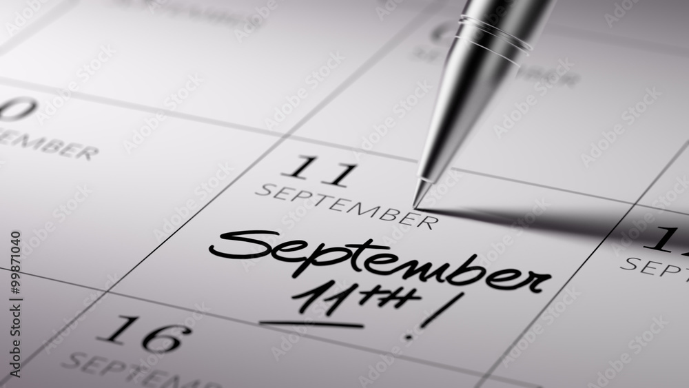 Closeup of a personal agenda setting an important date written w Closeup of a personal agenda setting an important date written w