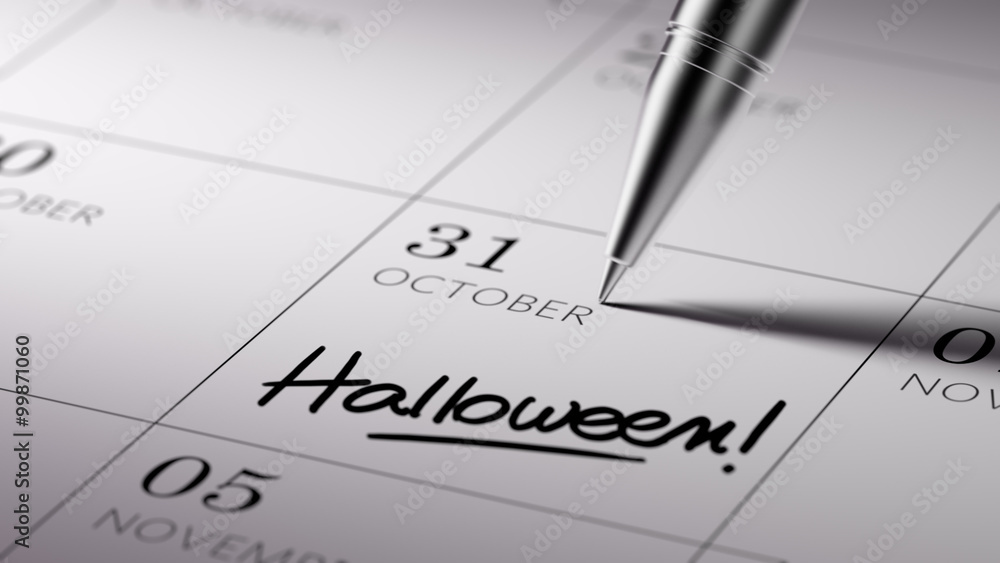 Closeup of a personal agenda setting an important date written w Closeup of a personal agenda setting an important date written w