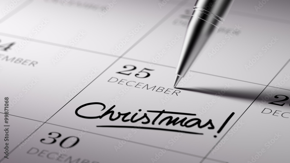 Closeup of a personal agenda setting an important date written w Closeup of a personal agenda setting an important date written w