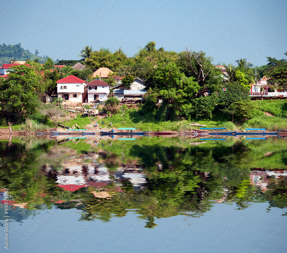 Huay Xai, Laos. Traveling by boat on Mekong river Huay Xai, Laos. Traveling by boat on Mekong river