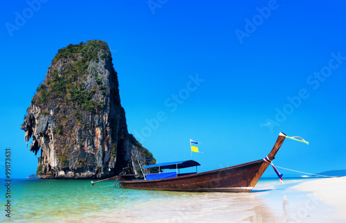 Thailand beach. Beautiful tropical landscape with boat © Banana Republic