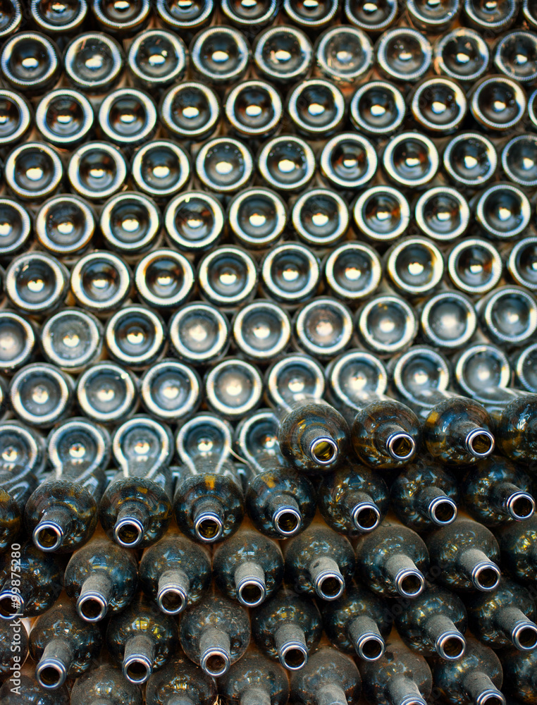 Rows of wine bottles in production factory Rows of wine bottles in production factory