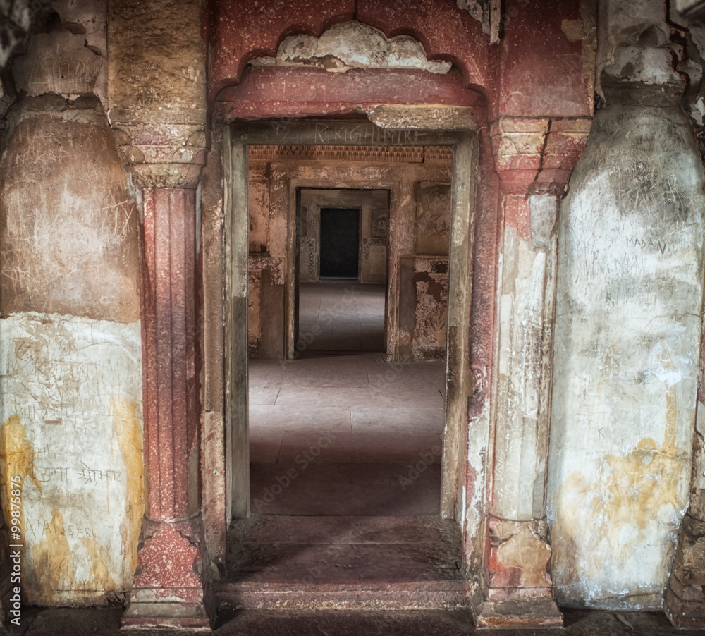 Perspective view of columns and doorways of ancient temple in India