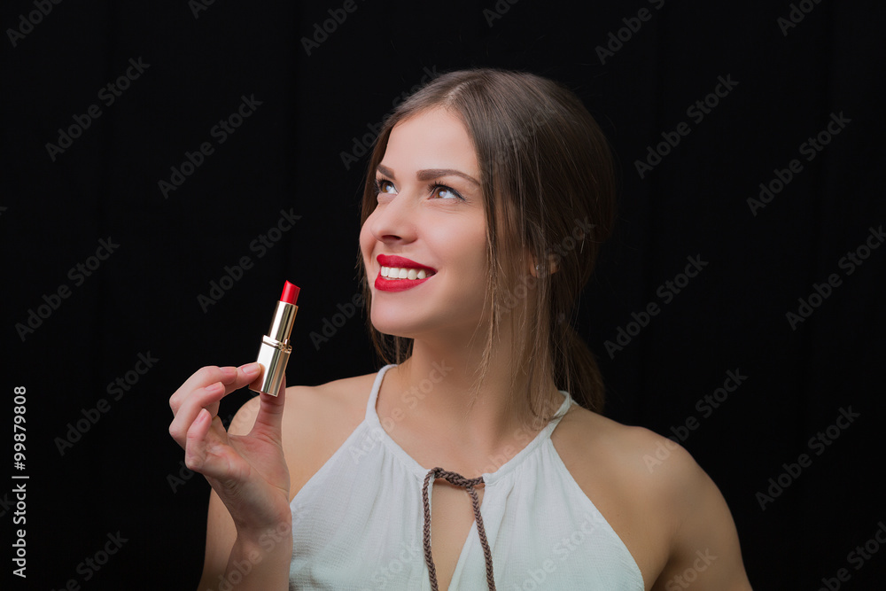 Fototapeta premium Woman with a red lipstick