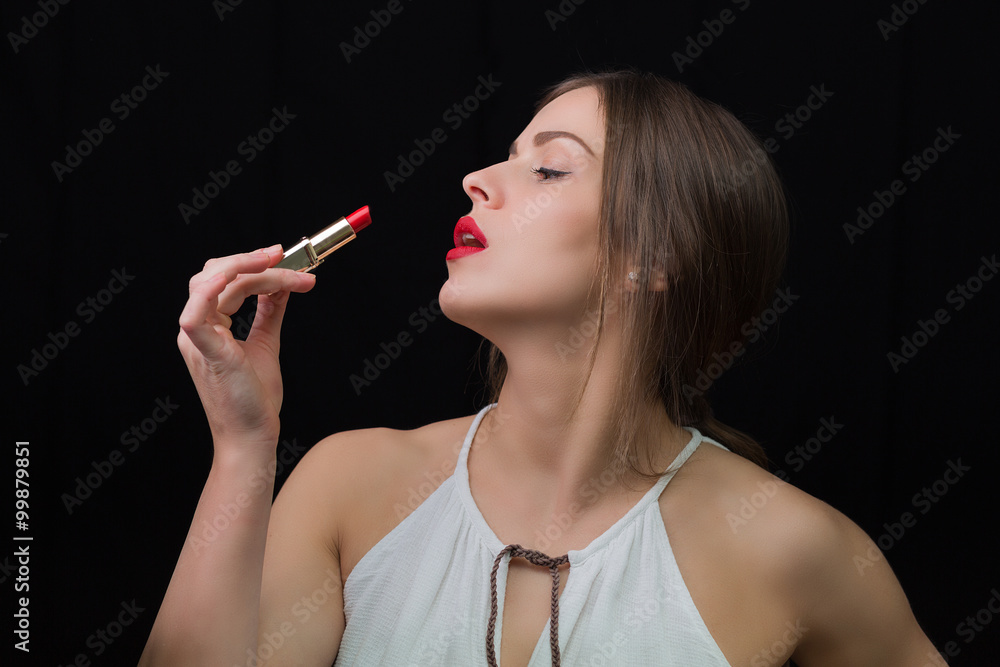 Obraz premium Woman with a red lipstick