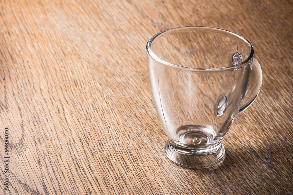Empty coffee expresso glass transparent cup on wood. Empty coffee expresso glass transparent cup on wood.