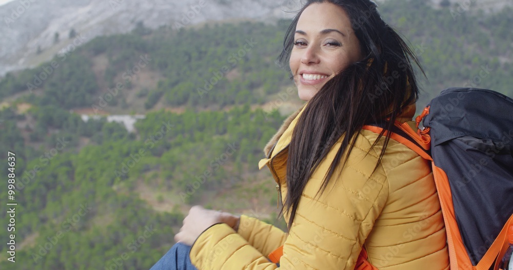 Happy vivacious young woman backpacker Happy vivacious young woman backpacker