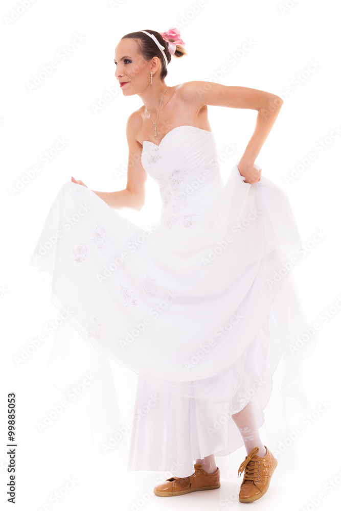 Wedding. Running bride funny woman in sport shoes Wedding. Running bride funny woman in sport shoes